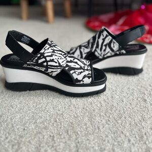 Stylish Sorel Black and White Wedge Sandals